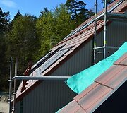 Čerpiniai stogai gyvenamųjų namų komplekse Kur&scaron;ių Nerijoje