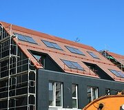 Čerpiniai stogai gyvenamųjų namų komplekse Kur&scaron;ių Nerijoje