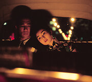 Maggie Cheung ir Tony Leung Chiu-wai filme &bdquo;Meilės laukimas&ldquo;