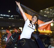 Berlyne futbolo sirgaliai &scaron;ventė Vokietijos rinktinės pergalę pasaulio futbolo čempionate