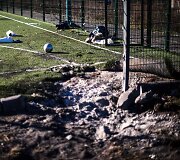 Ukrainos mokyklos stadione sprogo artilerijos sviedinys 