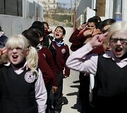 Aklųjų ir silpnaregių mokykloje Palestinoje vaikai mokomi pasitelkiant muziką