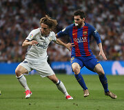 Luka Modričius ir Lionelis Messi