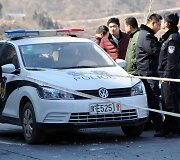 Kinijos policija vietoje, kur nuo skardžio nulėkė autobusas