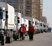 JT Humanitarinės pagalbos konvojus vyksta i&scaron; Damasko į kitus regionus