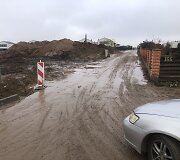 Romaini&scaron;kių gatvė Kaune virto purvynu