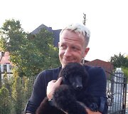 Maksas Melmanas su pudeliuke Leksi