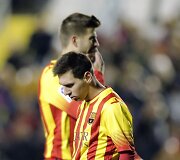Gerardas Pique ir Lioneliis Messi