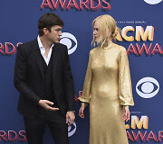 Ashtonas Kutcheris ir Nicole Kidman