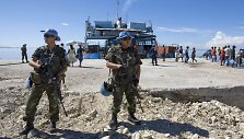 JT taikos palaikymo pajėgu kariai i&scaron; Argentinos prižiūri tvarką.