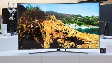 Lenktas SUHD televizorius su įdiegta &bdquo;Quantum-dot&ldquo; technologija.