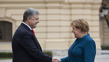 Petro Poro&scaron;enka ir Angela Merkel