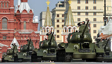 Russian T-34 tanks drive through Red Square during the Victory Day parade in Moscow on May 9, 2010. Troops from four NATO states marched through Red Square for the first time Sunday as Russia marked victory in World War II with its biggest military parade since the collapse of the Soviet Union. AFP 