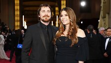 Nominantas Christianas Bale'as su žmona Sibi Blazic