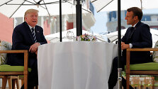 Donaldas Trumpas ir Emmanuelis Macronas