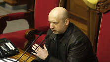 ITAR-TASS: KIEV, UKRAINE. FEBRUARY 22, 2014. Alexander Turchinov, Batkivshchyna faction deputy head, newly elected Ukrainian Parliament (Verkhovna Rada) chairman, at a Verkhovna Rada meeting. (Photo ITAR-TASS/ Maxim Nikitin)