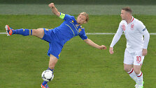 Anatolijus Timo&scaron;čiukas ir Wayne'as Rooney