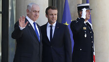 Emmanuelis Macronas su Benjaminu Netanyahu