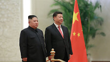 Kim Jong Unas ir Xi Jinpingas