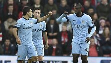 Sergio Aguero ir Yaya Toure