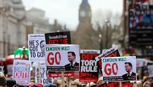 Protestas prie&scaron; Davidą Cameroną