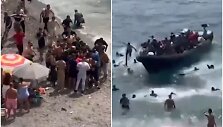 Ispanijoje migrantai užplūdo turistų pilną paplūdimį