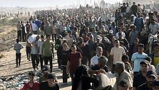 Palestiniečiai eina į naują pagalbos skirstymo punktą / Ahmed Ibrahim  apaimages/SIPA / Ahmed Ibrahim  apaimages/SIPA