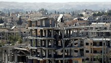 JAV remiamos pajėgos Sirijoje skelbia visi&scaron;kai užėmusios buvusią &bdquo;Islamo valstybės&ldquo; sostinę Raką
