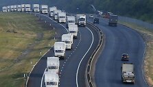 Rusijos &bdquo;humanitarinės pagalbos&ldquo; sunkvežimiai prie Voronežo miesto