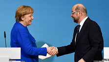 Angela Merkel ir Martinas Schulzas
