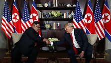 Kim Jong Unas ir Donaldas Trumpas