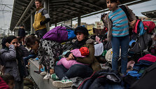 Atėnuose migrantai užėmė geležinkelio stotį, reikalaudami leidimo kirsti sieną