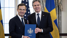 &Scaron;vedijos ministras pirmininkas Ulfas Kristerssonas ir JAV valstybės sekretorius Antony Blinkenas