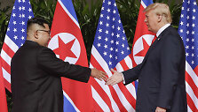 Kim Jong Unas ir Donaldas Trumpas