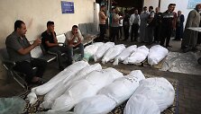 Palestiniečių kūnai po Izraelio atakos