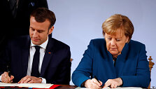 Emmanuelis Macronas ir Angela Merkel