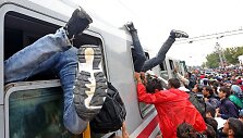 Migrantai traukiniuose