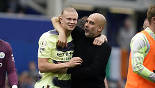 Erlingas Haalandas ir Josepas Guardiola.
