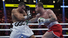 Genadijus Golovkinas (kairėje) ir Saulis Alvarezas