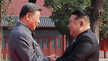 Xi Jinpingas, Kim Jong Unas