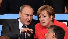 Vladimiras Putinas ir Angela Merkel
