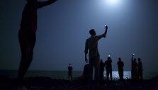 Johno Stanmeyerio nuotrauka: mėnulio ap&scaron;viesti migrantai