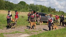 &bdquo;K-9 paie&scaron;ka&ldquo; savanoriai su &scaron;unimis