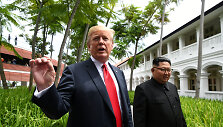 Kim Jong Unas ir Donaldas Trumpas