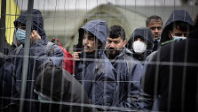 I&scaron; Rūdninkų migrantų stovyklos (&Scaron;alčininkų r.) gyventojai i&scaron;keliami į Kybartų (Vilkavi&scaron;kio r.) užsieniečių registracijos centrą