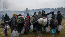 Migrantai pasienyje