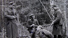 Didžiosios Kovos apygardos partizanų Karo lauko teismo inscenizacija. I&scaron; kairės: Romualdas Randis-Me&scaron;ka, Pranas Jaromskas-Perkūnas, Zigmas Žičius-Galiūnas ir Pranas Dzimidavičius-Puntukas. Henriko Dim&scaron;os nuotrauka, daryta 1946 m. pavasarį.
