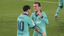 Lionelis Messi ir Antoine'as Griezmannas