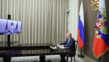 V.Putinas ir J.Bidenas