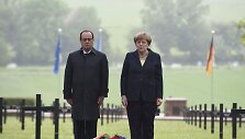 Francois Hollande'as ir Angela Merkel vokiečių karių kapinėse Konsanvua